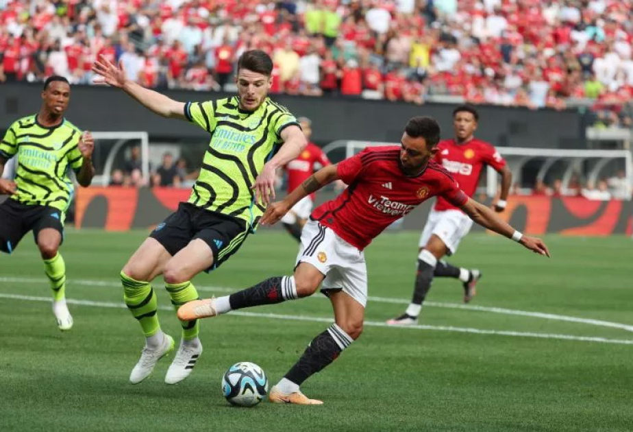 Arsenal beats Man United 1-0 to take title race with Man City to final day of Premier League season