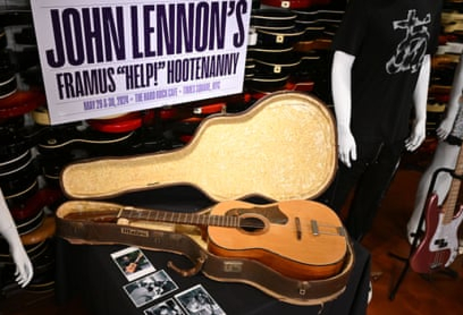 John Lennon guitar sells for $2.9m, breaking Beatles auction record