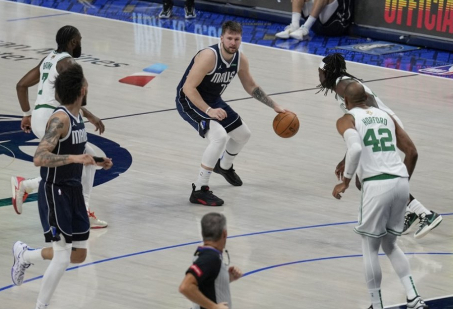Doncic scores 29, Mavericks roll past Celtics 122-84 to avoid a sweep in NBA Finals