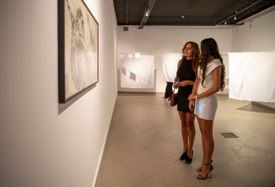 Aida Mahmudova attends reopening of "YAY" gallery
