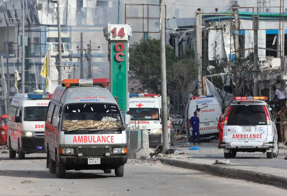 At least 5 killed in bombing targeting a busy café in the Somali capital, police say