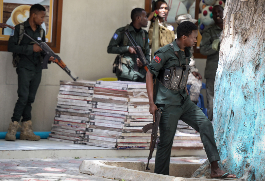 Explosion and gunfire rock hotel at popular beach in Somalia’s capital, witnesses say