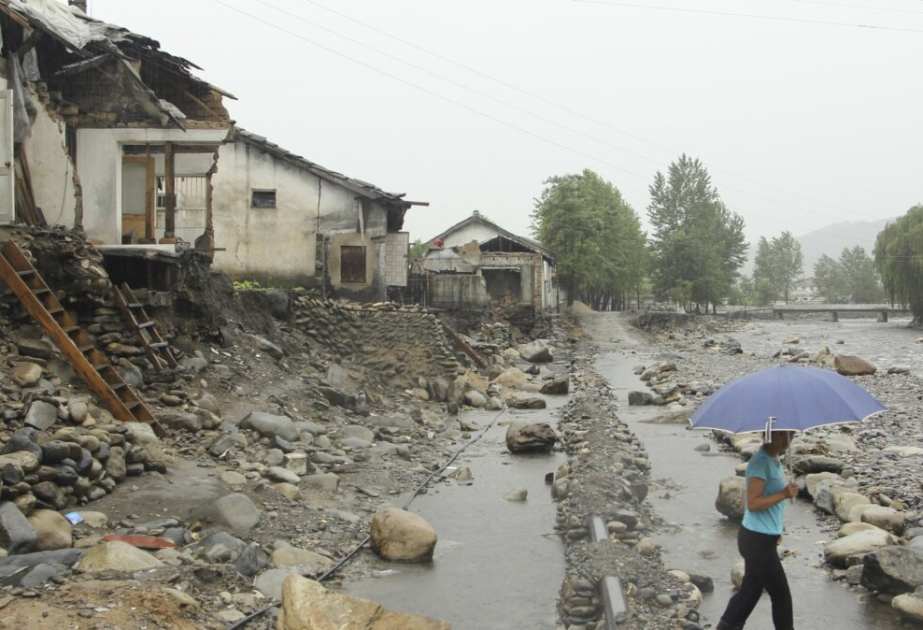 North Korean leader says thousands of flood victims will be brought to capital for temporary care