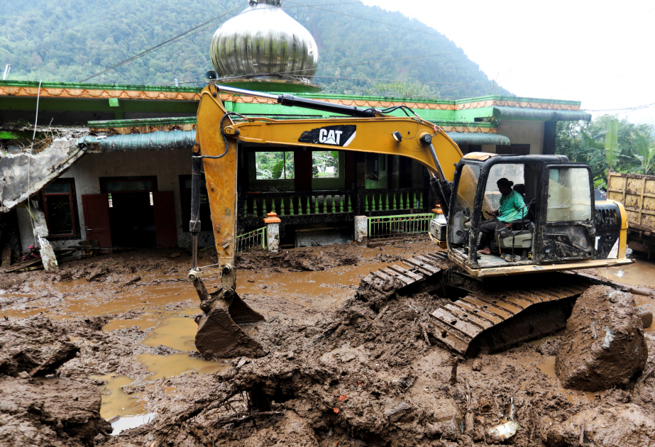 Landslides in Indonesia's Sumatra kill at least 27