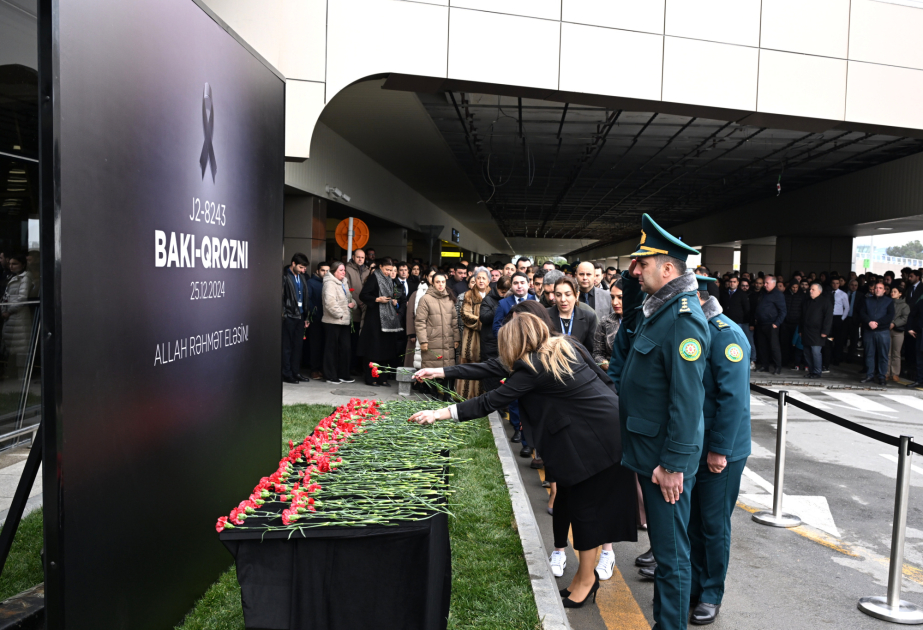 Staff of Heydar Aliyev International Airport honors memory of plane crash victims