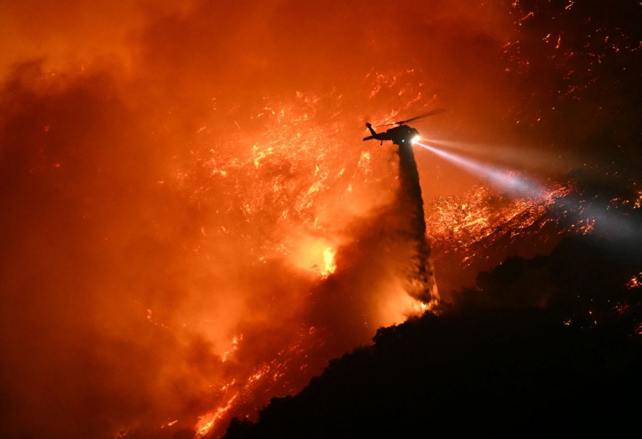 Death toll rises to 16 as firefighters continue to battle spreading wildfires in Los Angeles