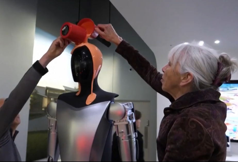 UK climate activists target Tesla robot in Elon Musk protest