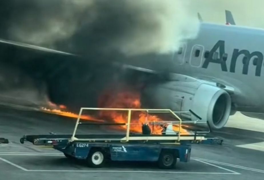 American Airlines flight catches fire at Denver airport
