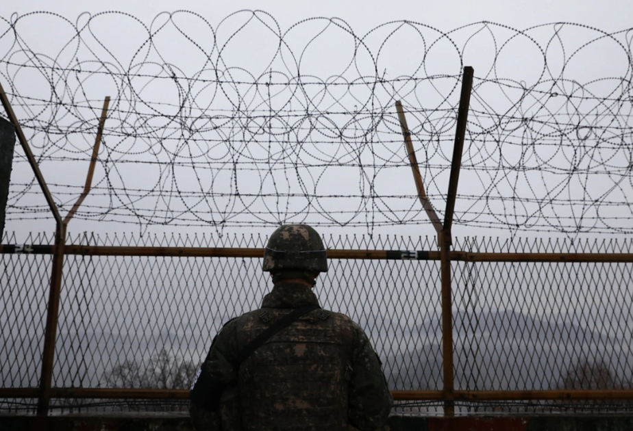 S. Korea's military fires warning shots at N. Korean soldiers as they cross military demarcation line