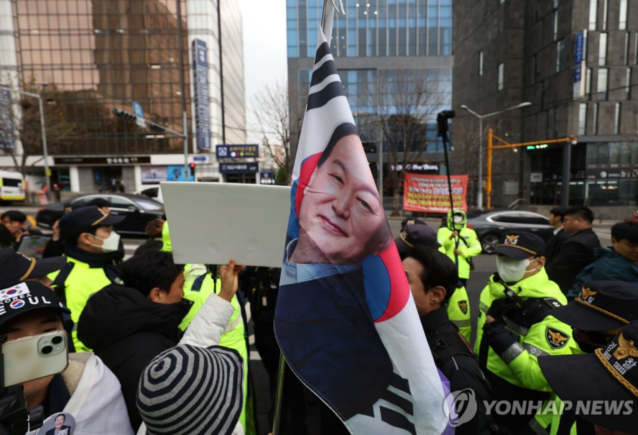 S. Korea's ex-President Yoon attends first criminal trial on insurrection charges