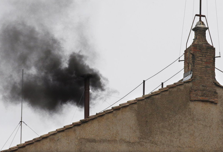 Black smoke from Sistine chimney, no pope elected