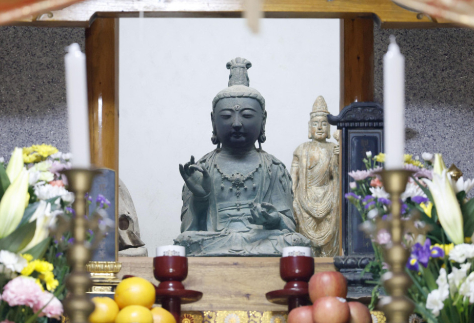A Buddhist statue stolen from Japanese temple nearly 13 years ago is returned from South Korea