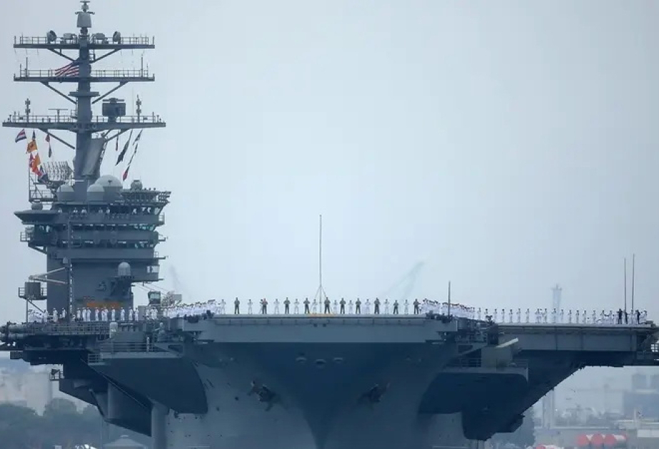 US aircraft carrier heads west from South China Sea amid Middle East tensions
