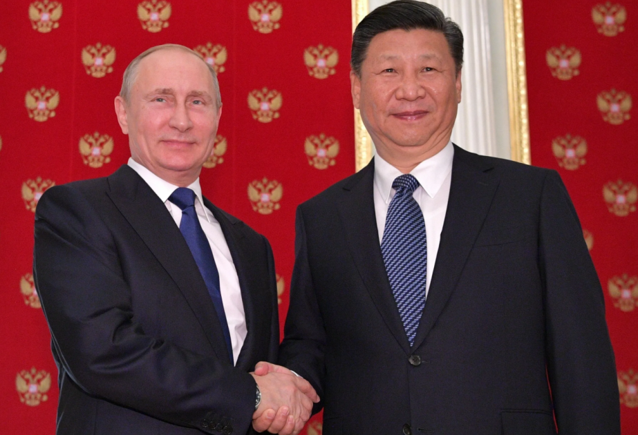 Si Cinpin və Vladimir Putin Yaxın Şərqdəki vəziyyəti müzakirə ediblər