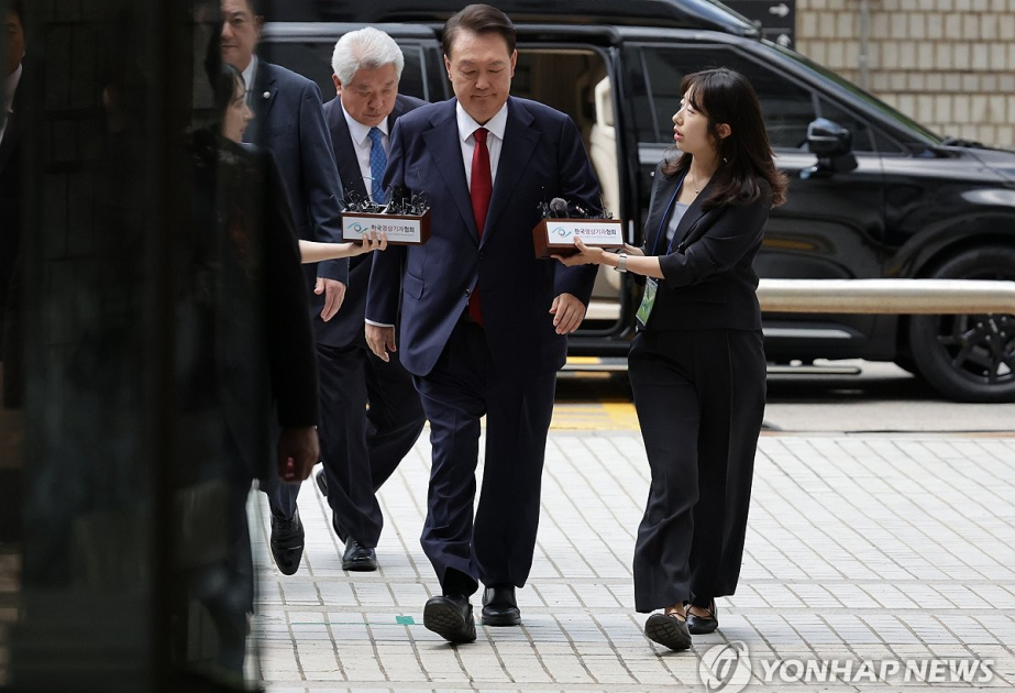 Ex-President Yoon attends court hearing on his potential arrest