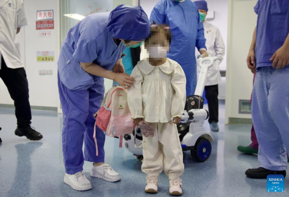 Chinese team implants artificial heart in world's youngest, lightest patient