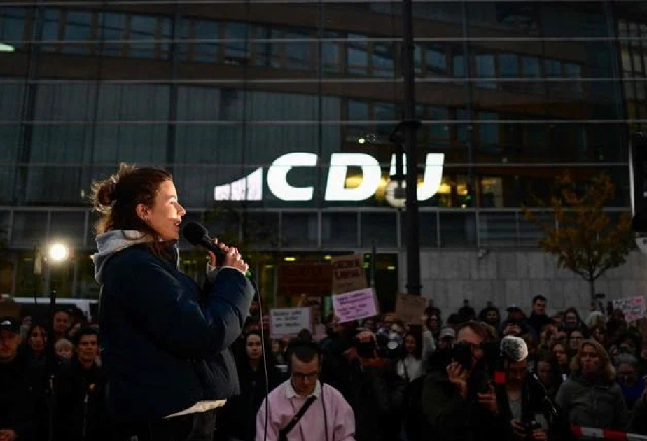 Thousands protest in Berlin against chancellor's controversial remarks about migrants amid growing backlash
