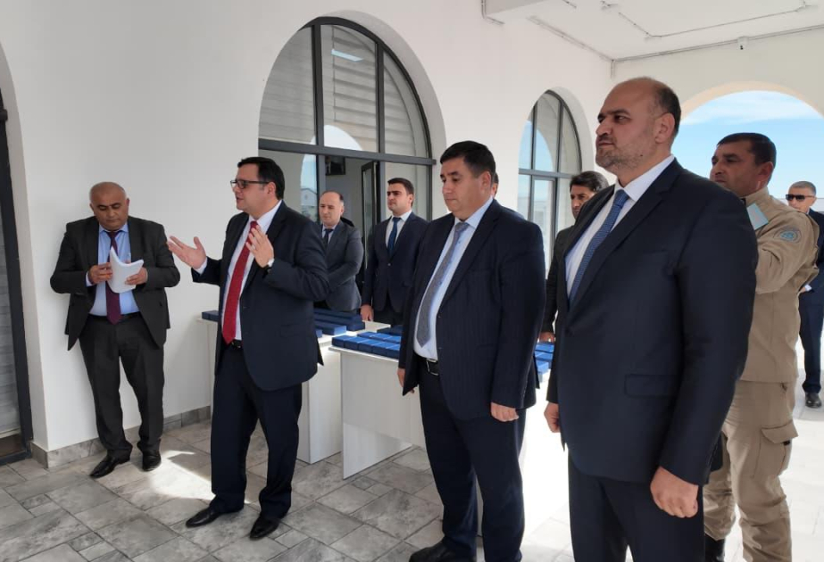 تقديم مفاتيح البيوت إلى العائلات التي أعيدت اليوم إلى قرية خضرلي في أغدام المحررة من الاحتلال الأرميني