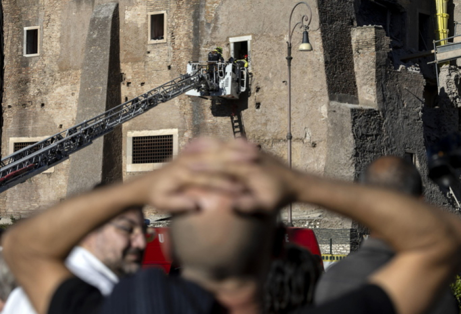 Worker dies after being trapped under Rome tower rubble
