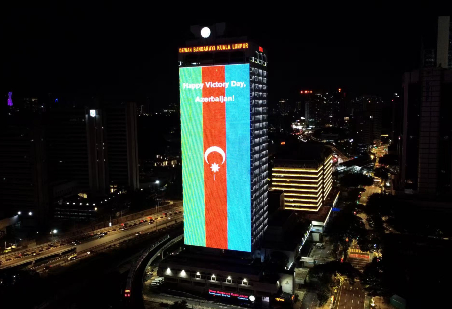 Kuala Lumpur City Hall building illuminated in colors of Azerbaijani flag