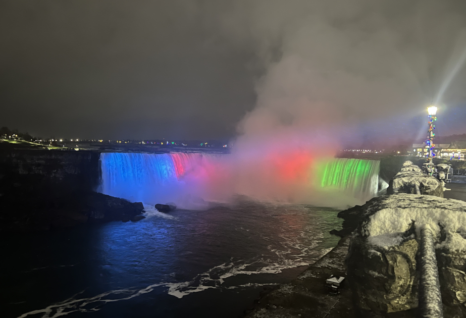 Niagara Falls lit up with colors of Azerbaijani Flag