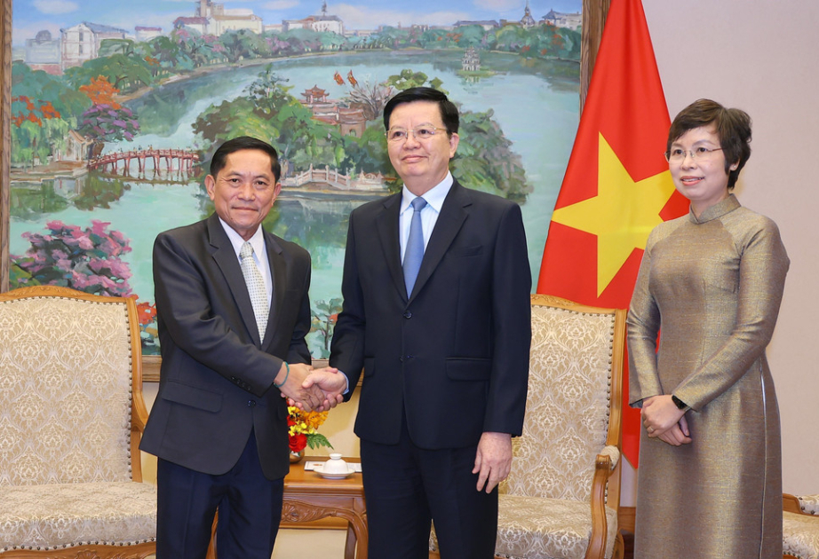 Vietnam, Laos step up press cooperation