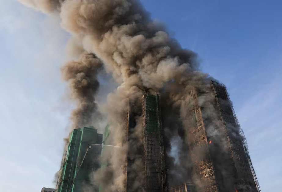 Four dead as major fire breaks out in northern HK housing estate
