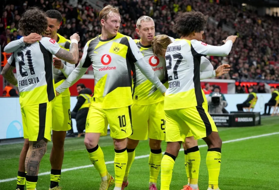 Dortmund survives late pressure to edge Leverkusen