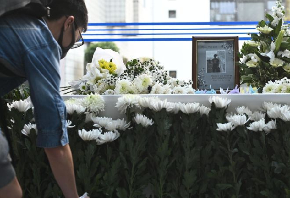 Тысячи человек отдали дань памяти жертвам самого смертоносного пожара в Гонконге