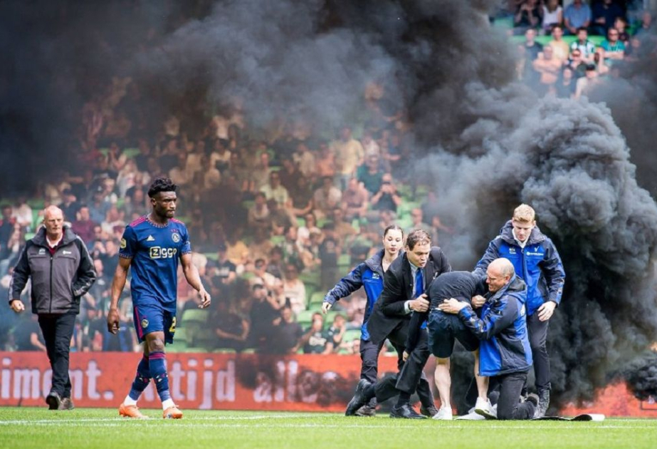 Ajax criticize 'outrageous' fireworks after match abandoned
