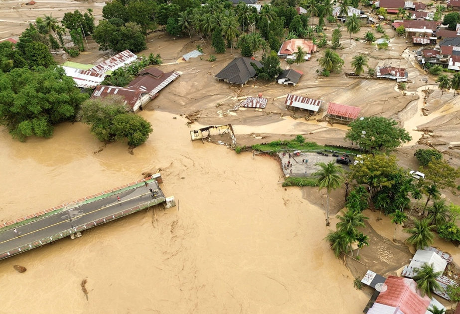 Death toll from heavy rain in Asia climbs to over 1,300, more than 900 missing