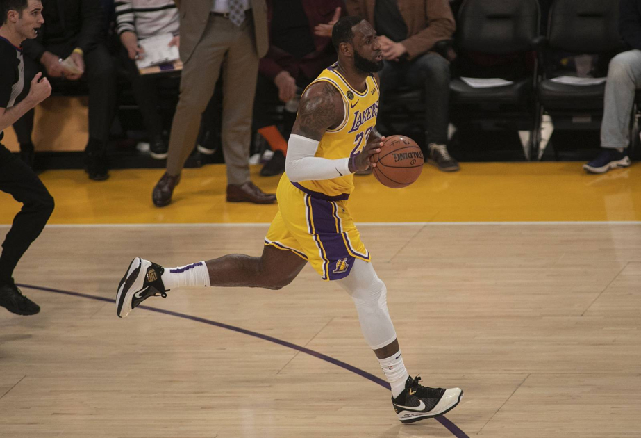 James and Doncic each score 30 to help the Lakers hold off the Pelicans 111-103