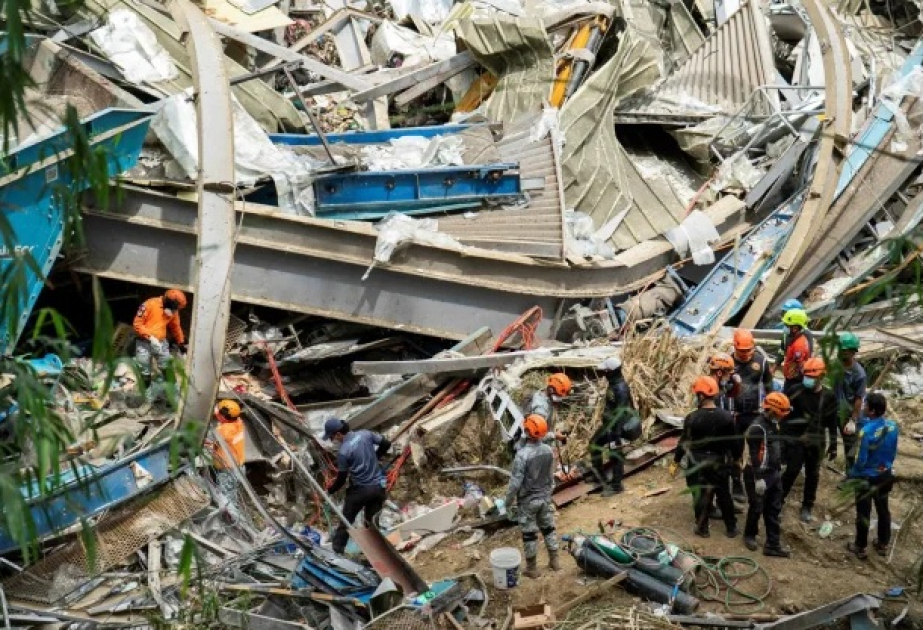 Death toll in central Philippine dumpsite collapse rises to 8