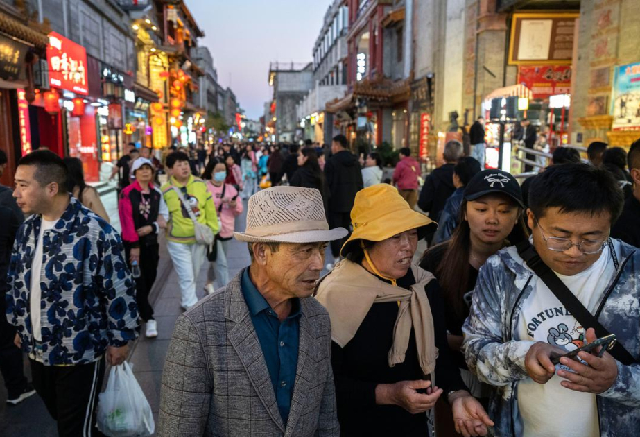 China's population drops for fourth year as fewer babies born