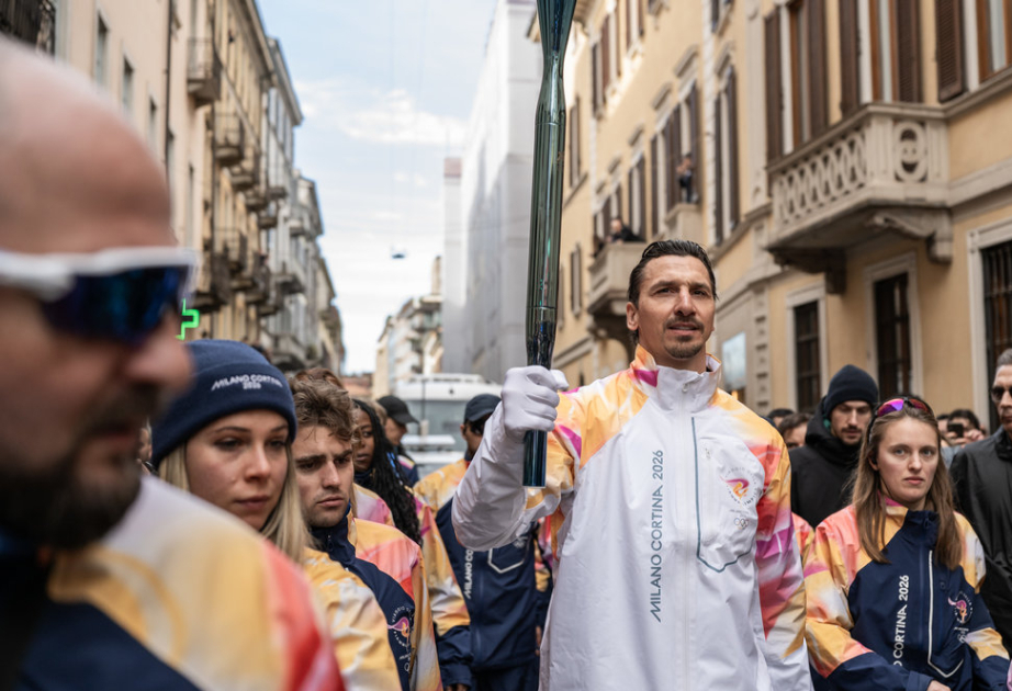Zlatan Ibrahimovic carries Olympic torch through streets of Milan