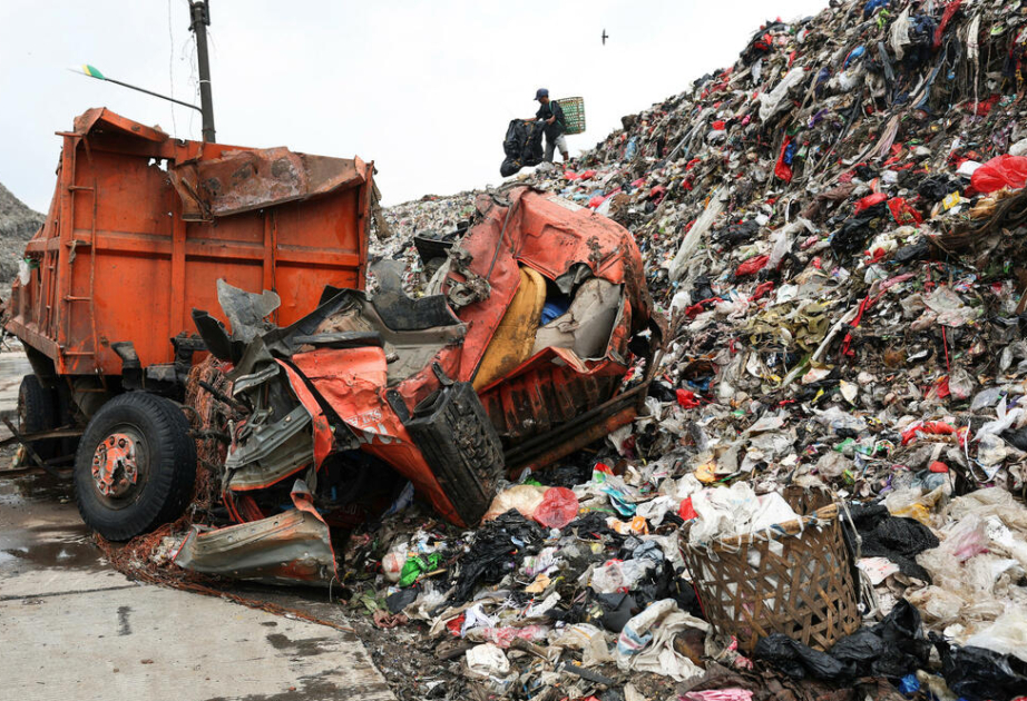 Indonesia searches for missing after landfill collapse kills four