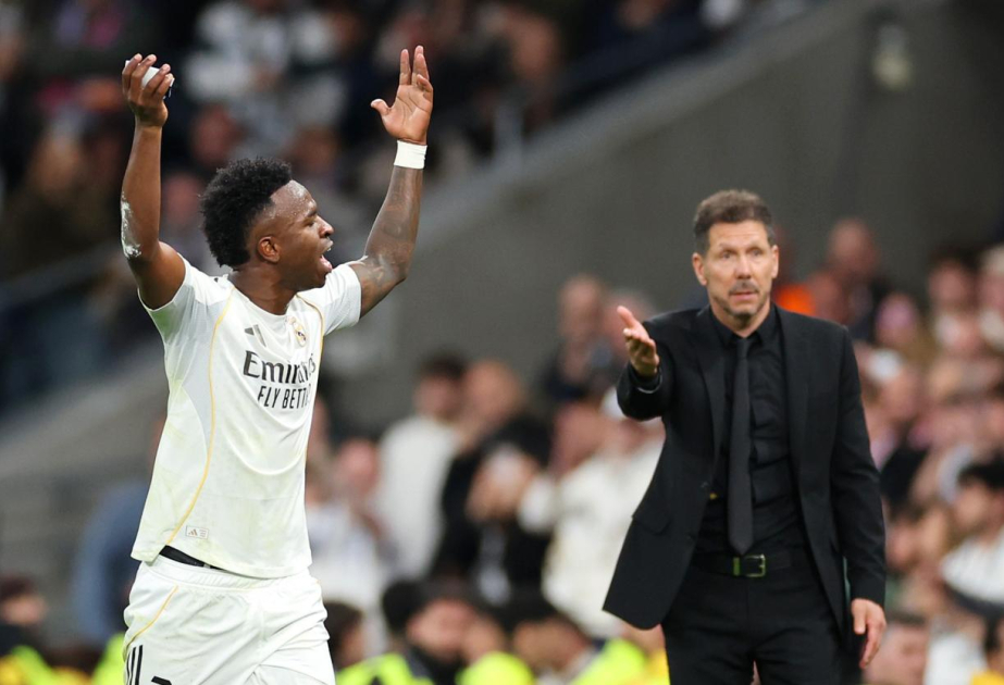Vinicius double helps Real Madrid edge Atletico thriller