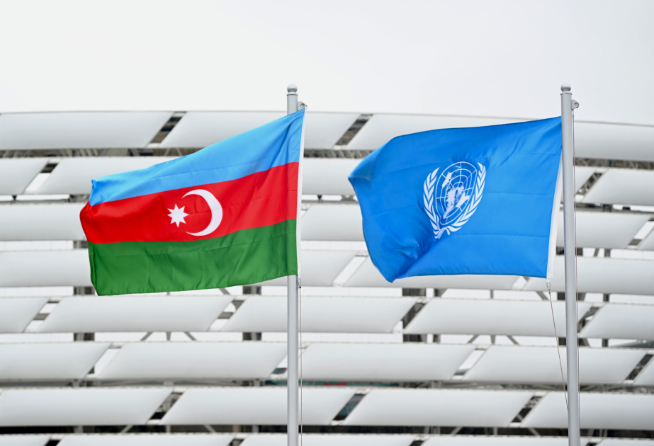 WUF13: Flags of the United Nations and the Republic of Azerbaijan raised