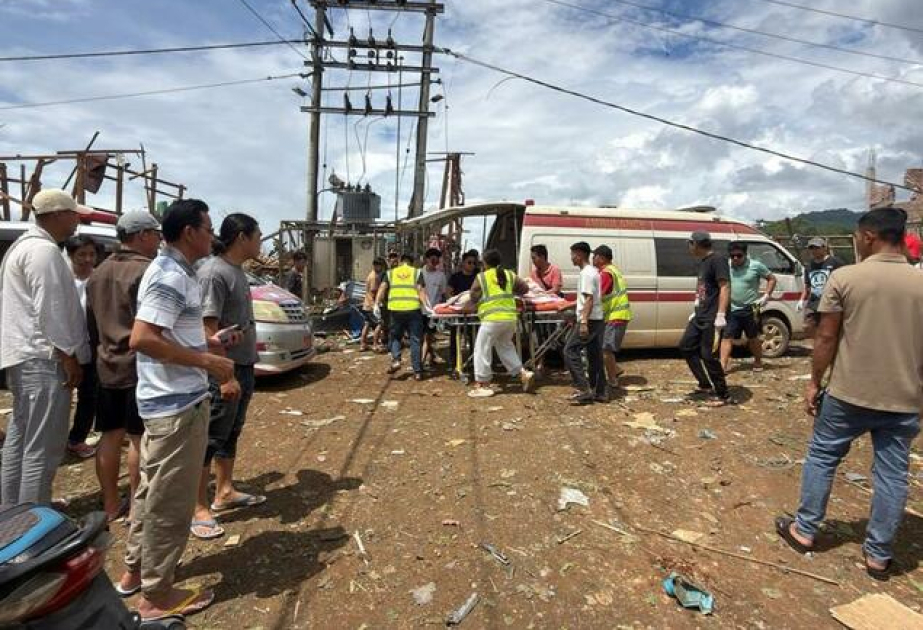 Rescuers dig for bodies after a mining explosives blast in Myanmar kills at least 43