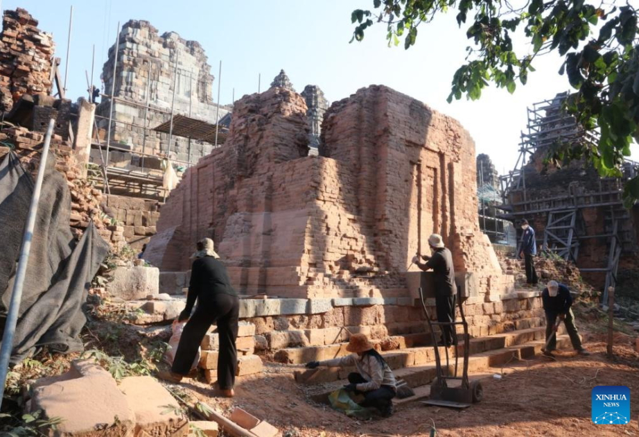 Archaeologists restoring millennium-old Bakong towers in Cambodia's Angkor park