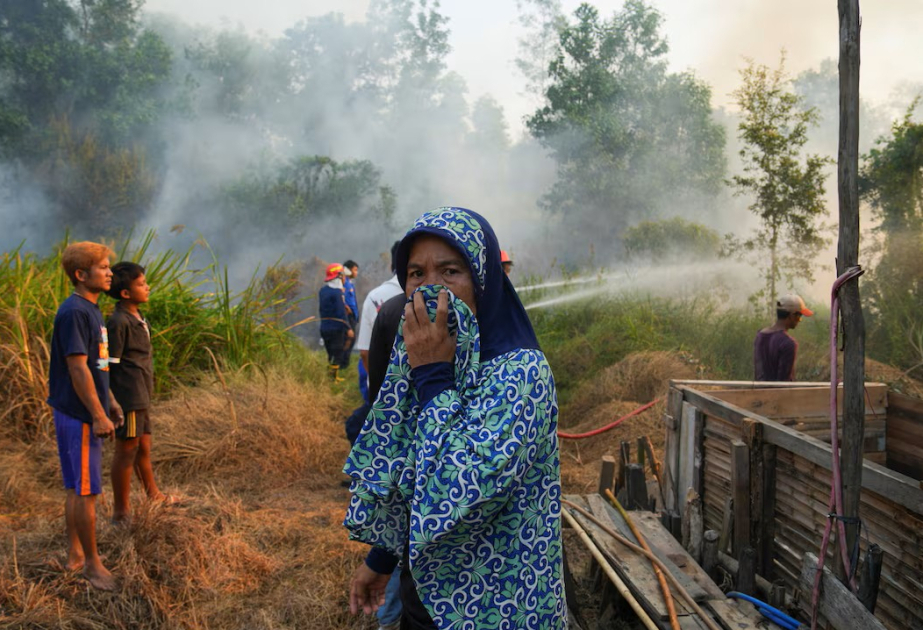 Indonesia races to contain fires as haze spreads across region