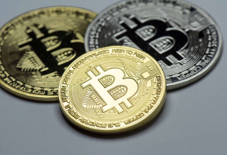 Bitcoin surpasses $77,000 for 1st time since May
