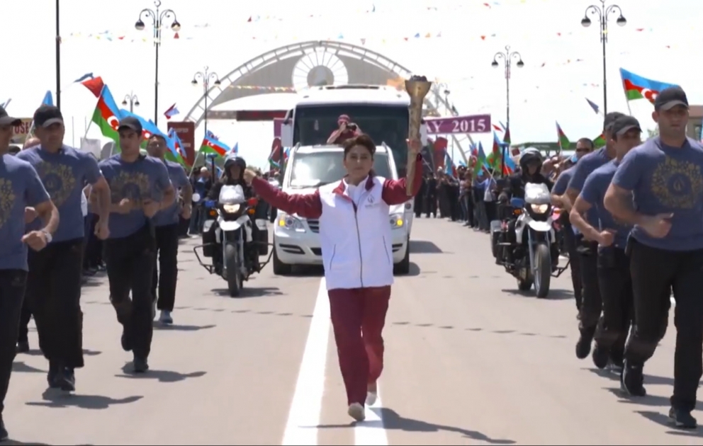 Bilasuvar is the next stop on the journey of Baku 2015 flame VIDEO