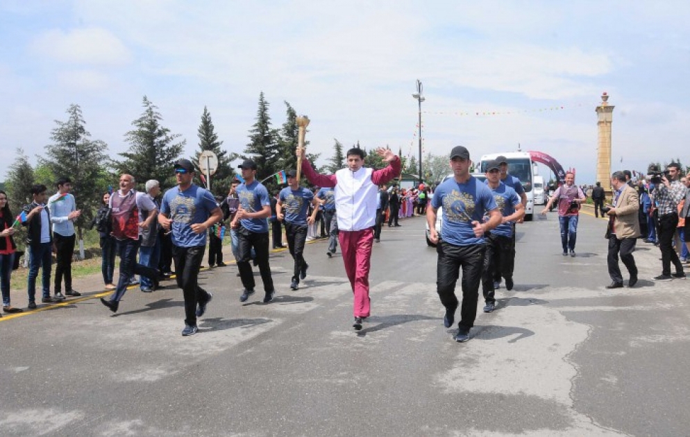 Baku 2015 flame arrives in Shirvan VIDEO