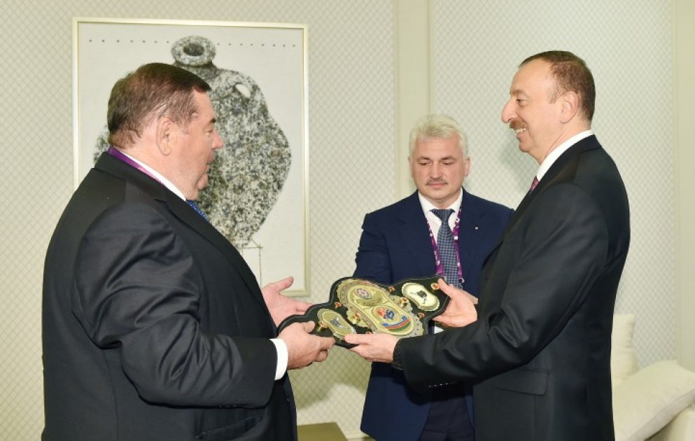 President Ilham Aliyev was presented with the Championship belt of sambo by the decision of the Executive Committee of the International Sambo Federation VIDEO