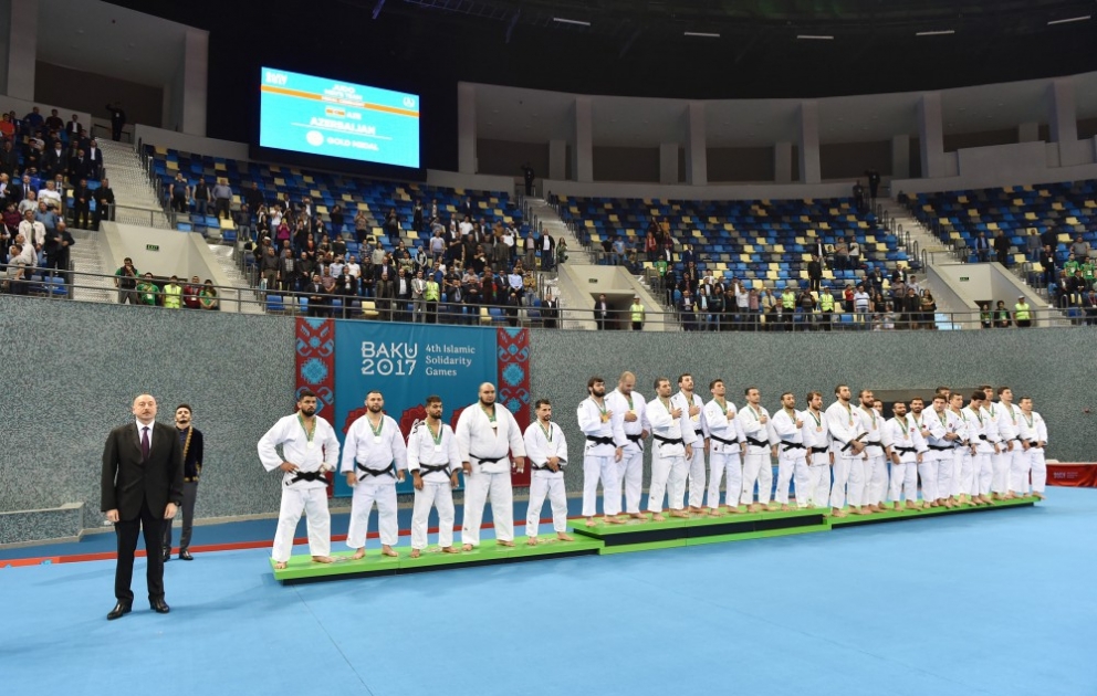 Azerbaijani judo fighters claimed gold in men`s team event, while female fighters won silver at Baku 2017  President Ilham Aliyev presented medals to Azerbaijani athletes VIDEO