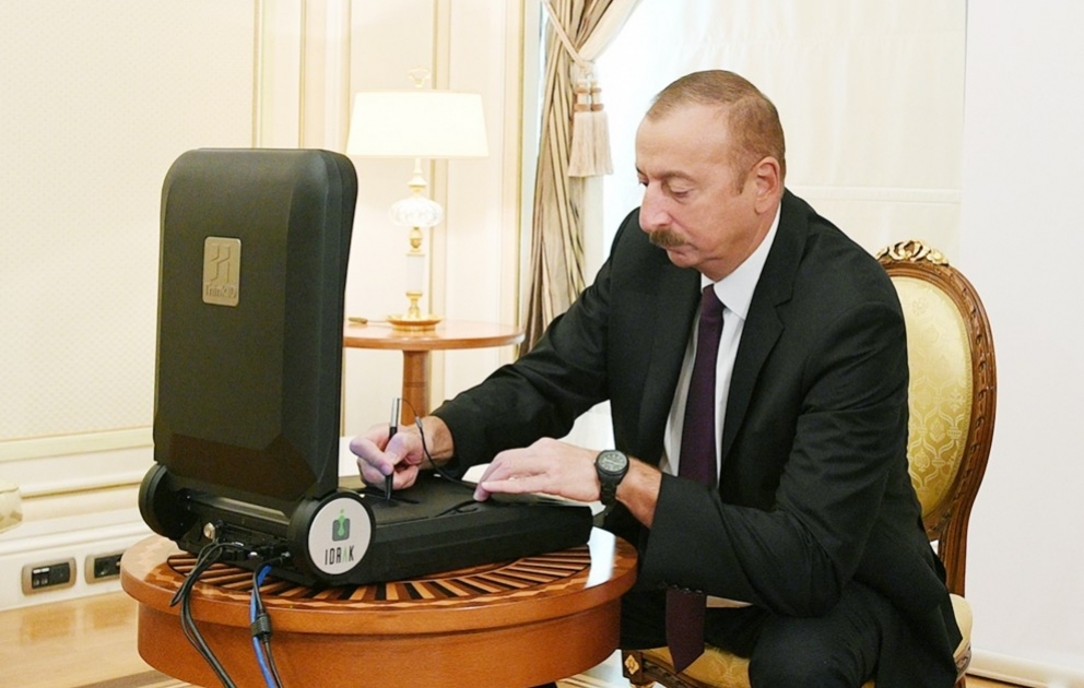 New generation biometric identity card No 1 presented to President Ilham Aliyev VIDEO