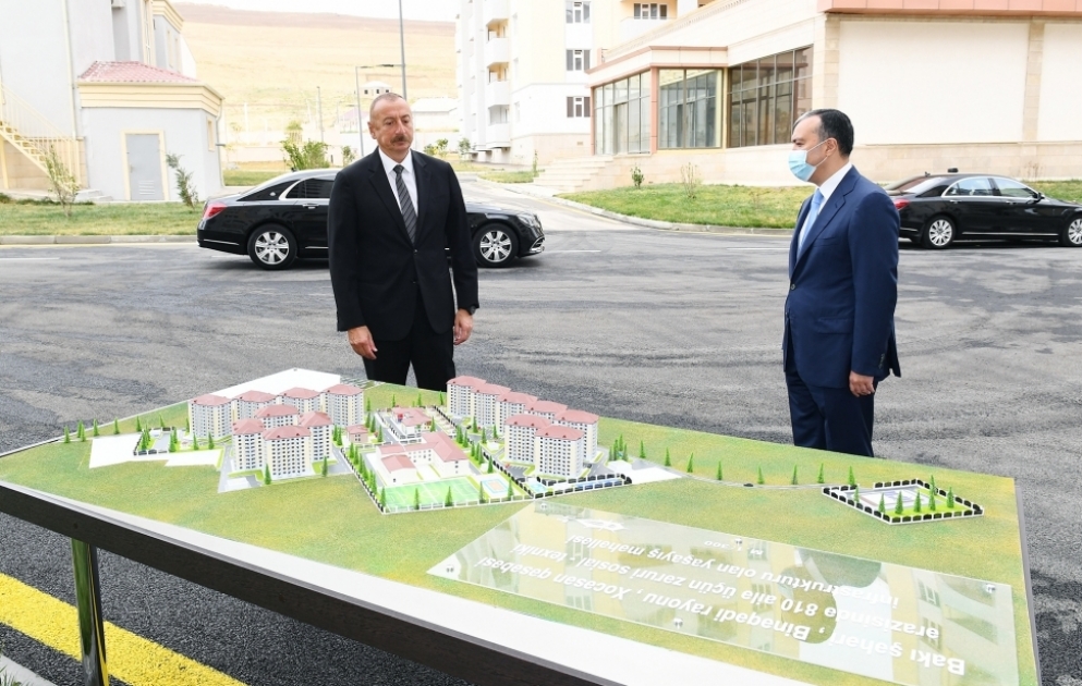 President Ilham Aliyev attended ceremony to give out apartments and cars to families of martyrs and war disabled in Khojasan settlement VIDEO
