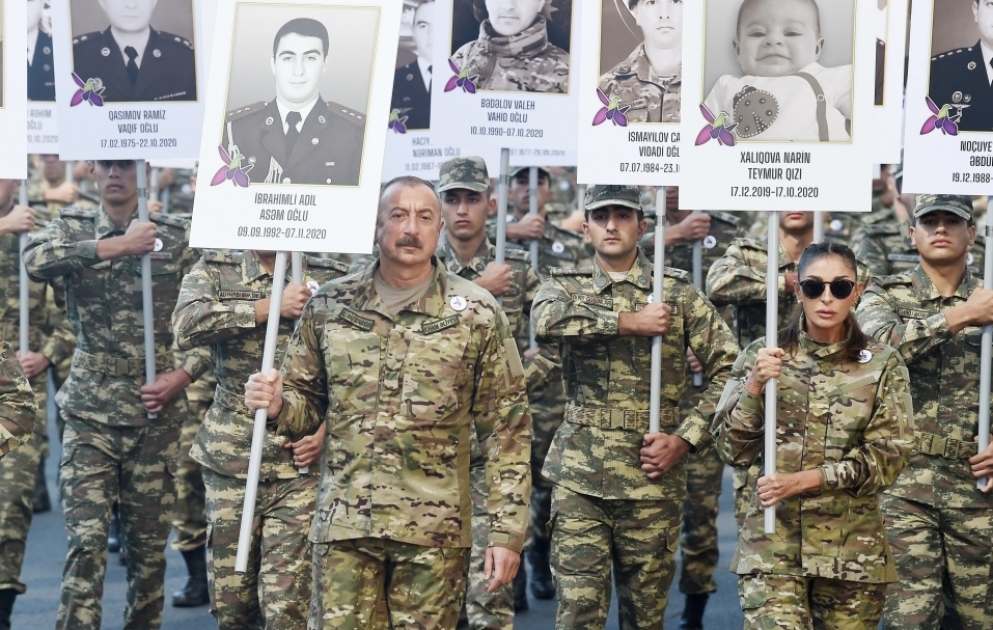 March to pay tribute to memory of Patriotic War martyrs was held in Baku  Victorious Commander-in-Chief, President Ilham Aliyev and First Lady Mehriban Aliyeva joined the march VIDEO