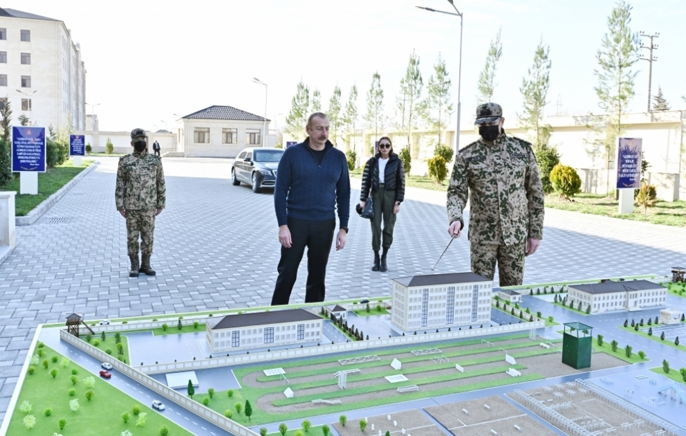 Ağcabədidə DİN-in Daxili Qoşunlarının yeni inşa edilən hərbi şəhərciyinin açılışı olub  Tədbirdə Prezident İlham Əliyev və birinci xanım Mehriban Əliyeva iştirak ediblər VİDEO